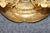 This highly decorative French Louis XVI-style gilt-brass and porcelain Bouillotte lamp is an unusually elaborate...