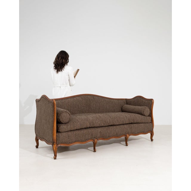 Here is a chair, its medium walnut, cabriole scroll form the first thing to catch the eye. It was made in France during...