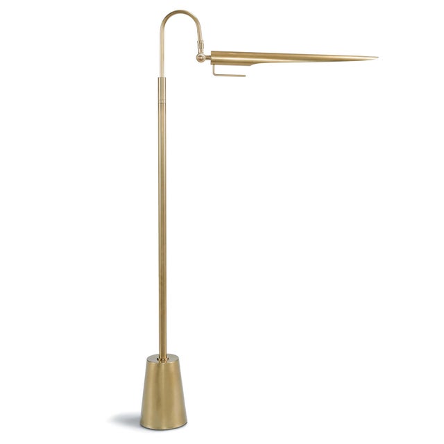 Its aerodynamic design with an adjustable shade, evoking a bird-like silhouette, makes this lamp a functional piece of...