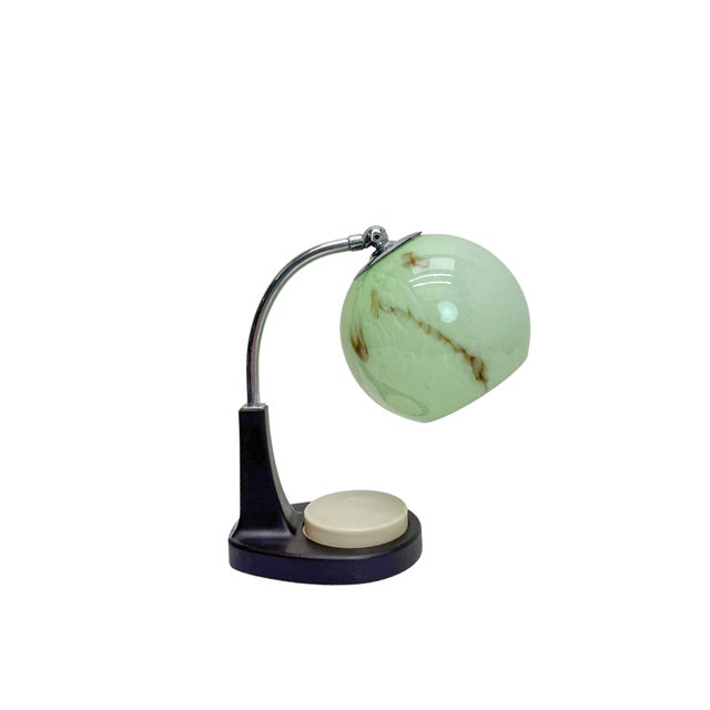 Early bauhaus “tastlicht”’ table lamp/night light, by the designer marianne brandt. marked on the base: gmf (gothaer...