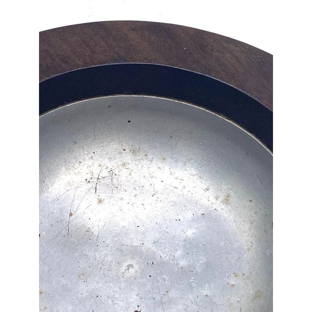 This is a wood ashtray, with a beautiful patina, in brown and crème color. This is vintage, from France. Measures:...