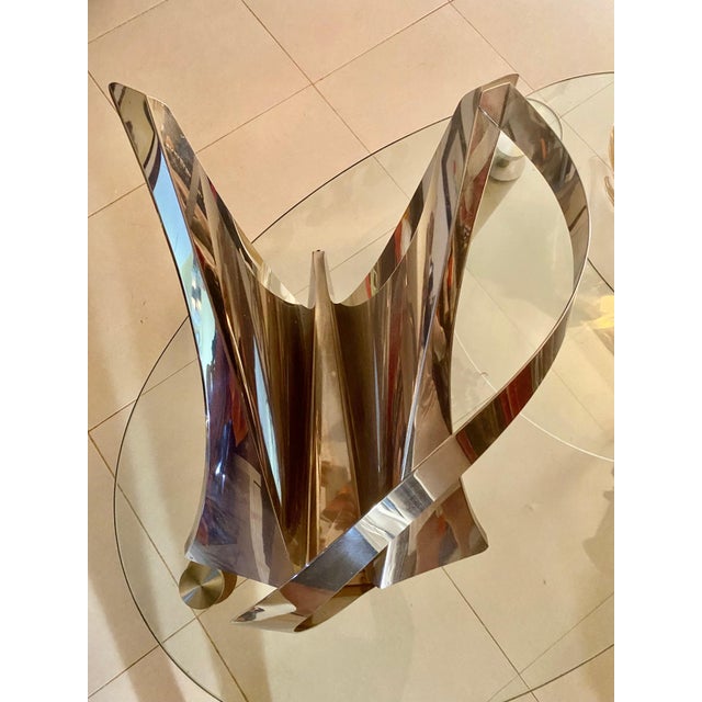 Unique Swan in large stainless steel, allowing it to be an exceptional sculpture or a magazine holder. This element of...