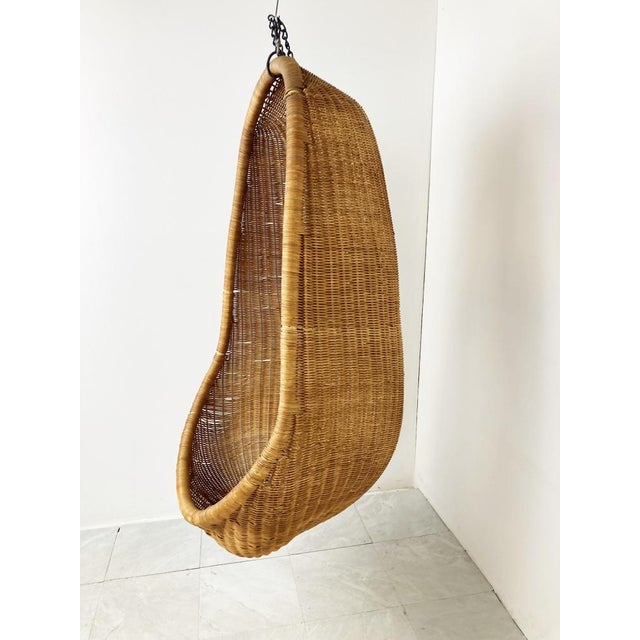 Mid-Century wicker hanging egg shaped chair by Nanna Ditzel. Beautiful and very original 'loung' chair with a timeless...