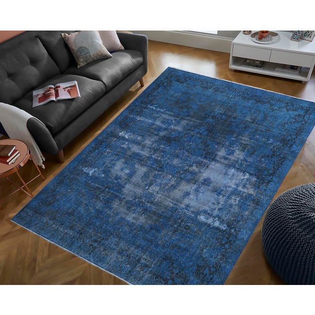 Elevate your home with the timeless beauty of a handmade Persian rug, renowned for its exceptional craftsmanship, rich...