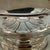 n elegant antique French silverplate gravy boat by Christofle, featuring an integrated underplate that creates a graceful,...