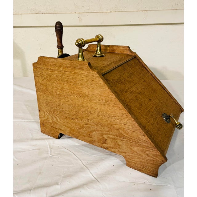 A lovely unique Antique Bleached Walnut Coal Hood./Scuttle. The unique piece features original brass hardware and a...