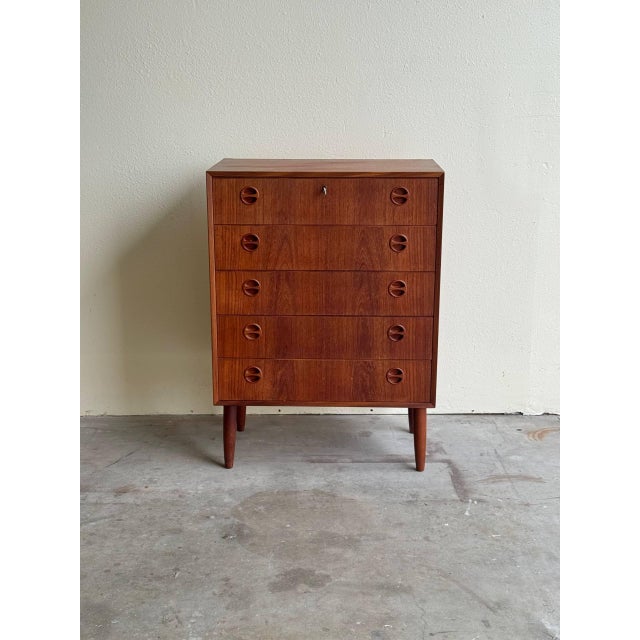 Beautiful original mid-century Danish teak highboy dresser, crafted in the 1960s and showcasing classic Scandinavian...