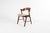 A stunning Danish Mid-Century Modern dining chair by Korup Stolefabrik, crafted from richly grained rosewood. The...