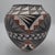 An exceptional hand-coiled Acoma Pueblo polychrome storage jar (olla) by Lydia H. Ray, affectionately known within her...