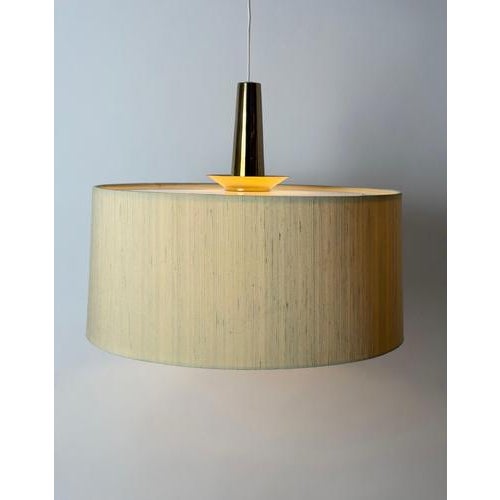 An elegant swedish pendant light dating to circa 1970, distinguished by its beautifully balanced proportions, minimalist...