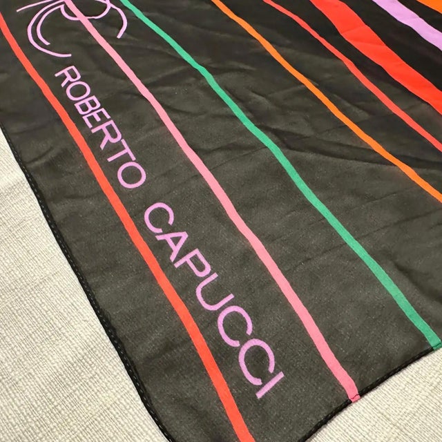 This is a stunning 1980s Italian long silk scarf by Roberto Capucci, known for his vibrant use of color and elegant...