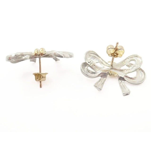 About This Piece: Vintage Tiffany & Co 18k Yellow Gold and Sterling Silver Ribbon Bow Earrings with 18k Yellow Gold...