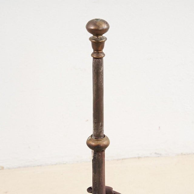 Pair of Antique Wrought Iron Andirons Height: 57 Width: 26 Depth: 52 Style: ANTIQUE Production Period: 1890 - 1919 Design...