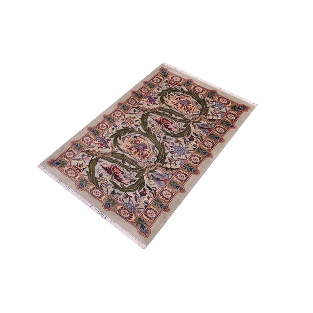 Designed with mesmerizing intricacy and gorgeous color palette, this hand-knotted masterpiece demonstrates the beauty and...