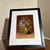 Beautiful vintage floral still life painting featuring a vibrant bouquet of multicolored flowers arranged in a decorative...