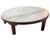 48 1/2"D x 14"H A statement of refined modernism, this marble coffee table embodies the visionary collaboration between...