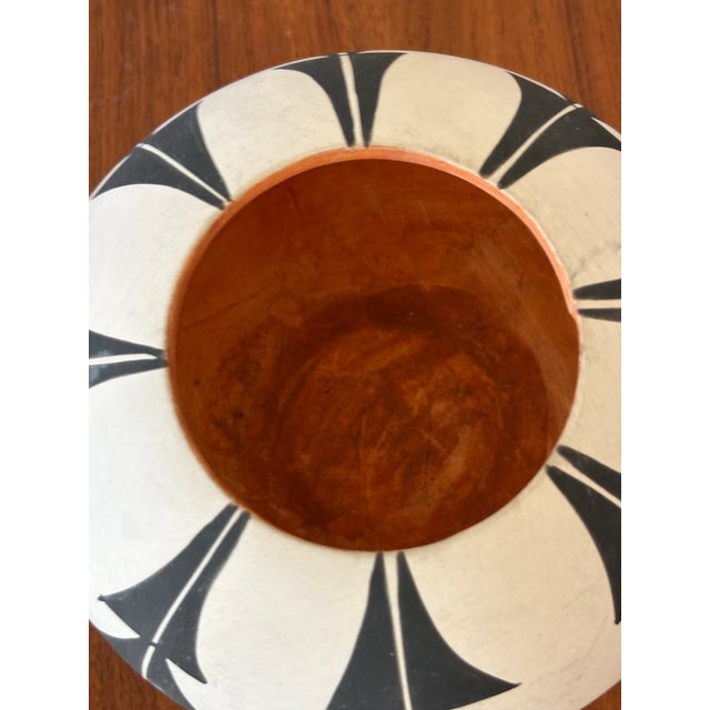 Beautiful signed Santa Clara Pueblo pottery bowl by Martha Concho of Santa Clara Pueblo. This low, rounded seed-pot form...