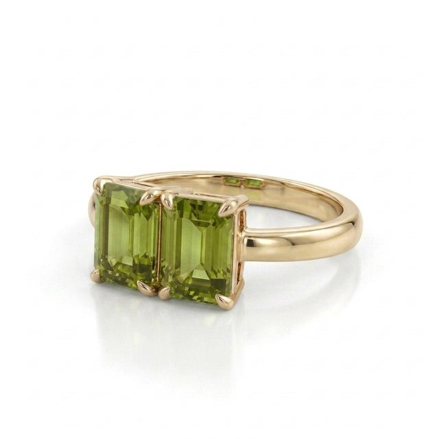Vibrant, refreshing, and full of life, this exquisite Toi et Moi ("You and Me") ring showcases a side-by-side pair of...