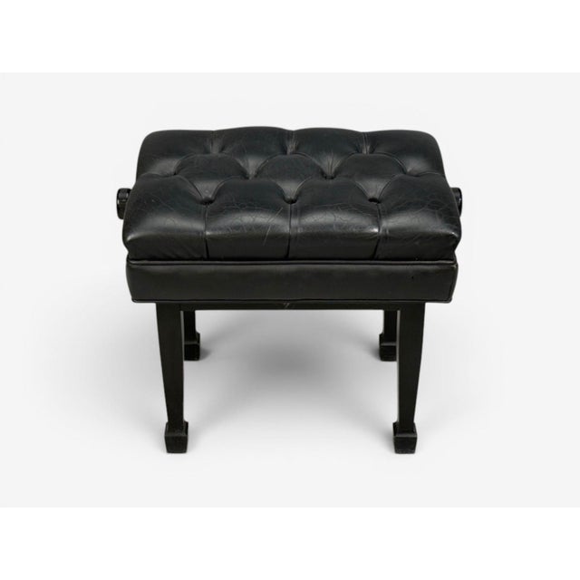 Steinway and Sons, Adjustable Piano Bench, Ebonized Wood, Leather, 21st c. An adjustable piano bench having a black...