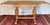This useful draw-leaf English oak table has a trestle base, carved bulbous Jacobean-style baluster legs fluted with...