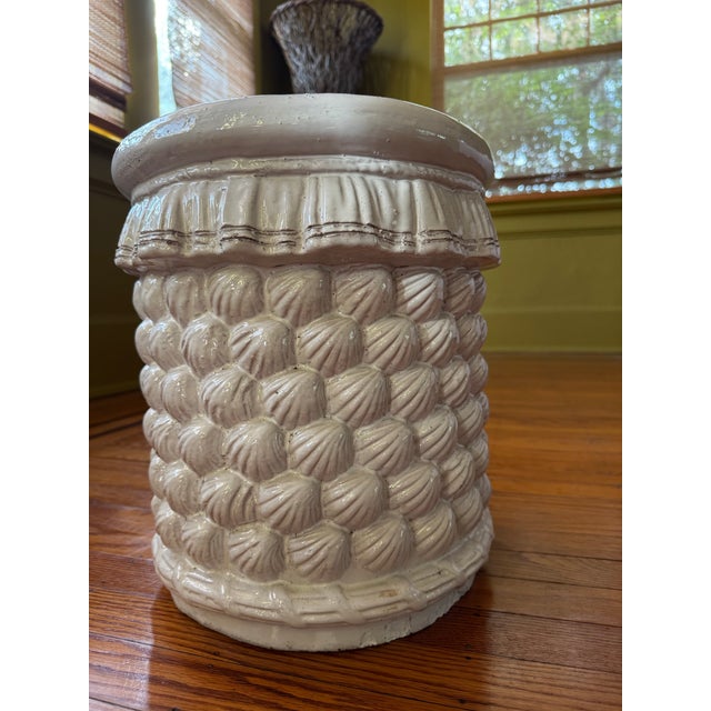 Beautiful Italian garden stool made in the 1960’s. White glazed terracotta with a very interesting shell design.