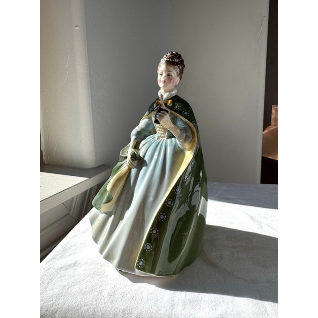Royal Doulton HN 2343 Figurine A classic example of mid-century English porcelain by Royal Doulton, the HN 2343 figurine...
