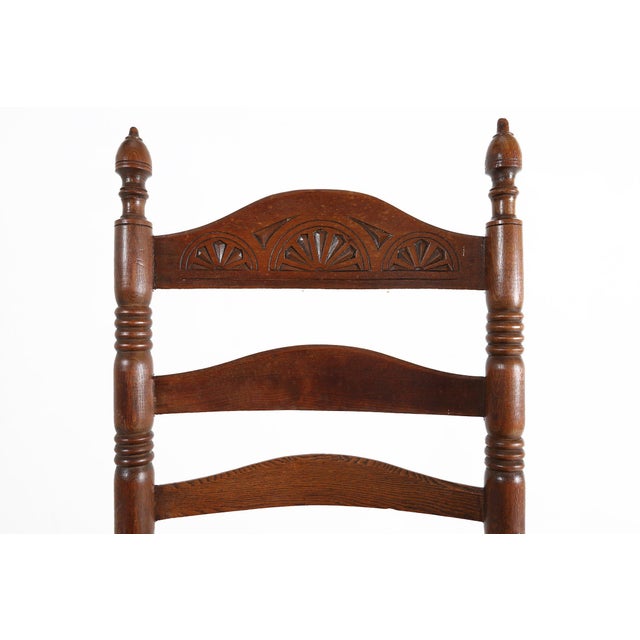 A charming example of Romantic rustic craftsmanship, this antique French armchair dates to around 1900 and captures the...