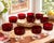 Elevate your entertaining with this beautiful set of ten vintage Luminarc Cavalier Ruby Red coupe glasses, expertly...