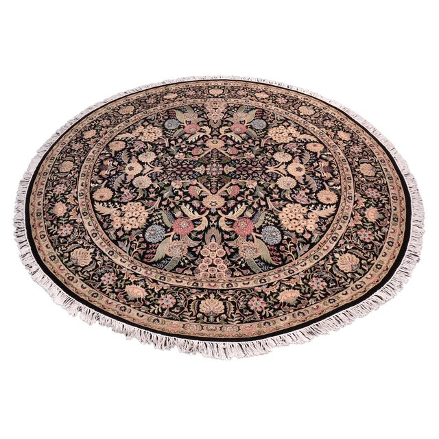 This hand‑knotted Pak Persian round rug showcases the finest expression of traditional Persian artistry. Each piece is...
