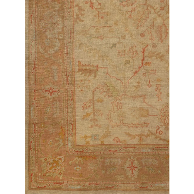 Antique Oushaks are known for their soft palettes combined with eccentric drawing. The relatively coarse weaves, here on a...