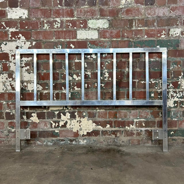 This Baughman-style aluminum contructed headboard has a clean and crispy modern design. It features an angular geometric...