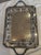 Add timeless elegance to your table or décor with this beautiful vintage silver-tone serving tray. Featuring an ornate...