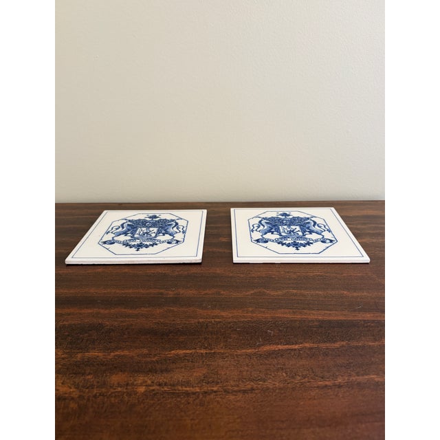 French Country Dutch Delft Blue and White Porcelain Tiles With Heraldic Coat of Arms, Pair For Sale - Image 3 of 5