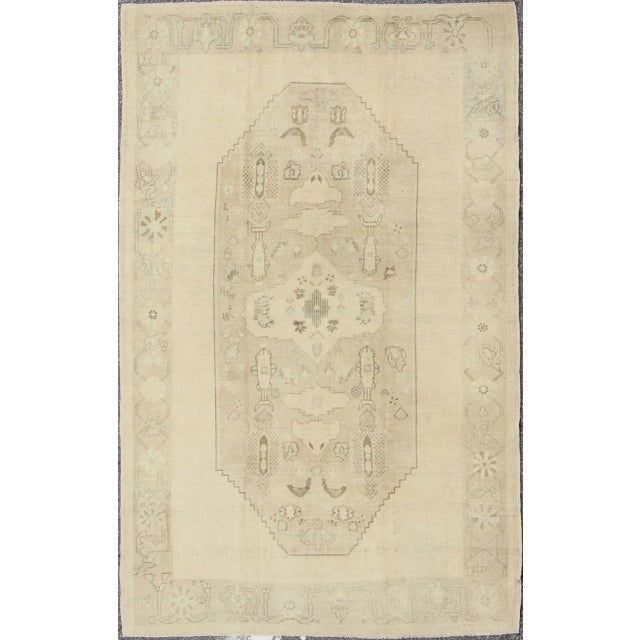Faded Turkish Oushak Rug With Cream and Brown Central Medallion 5'6 X 8'6 For Sale - Image 10 of 10