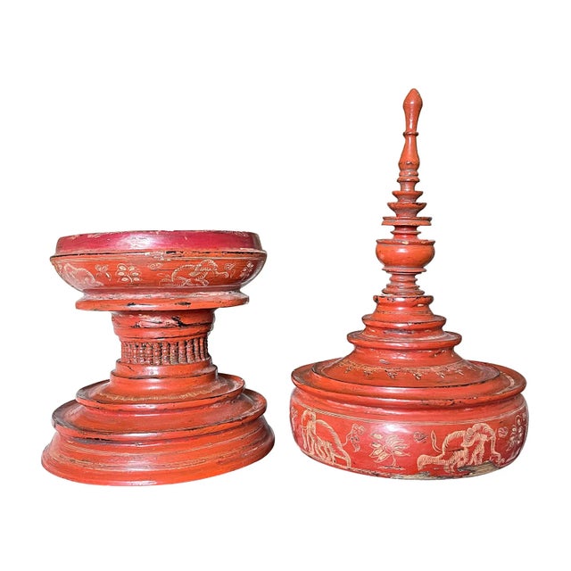 A lacquered Burmese offering bowl. Used by monks and in temples for offerings of food. Red lacquer decorated with the yun...