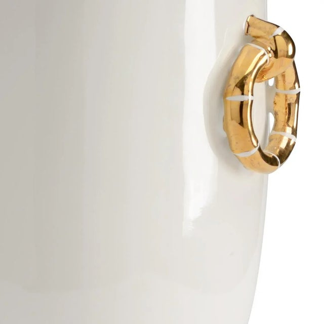 Complement Your Design Style With This Serene Decorative Accent. Ring Vase Is An Off White Glazed Porcelain Vase With...