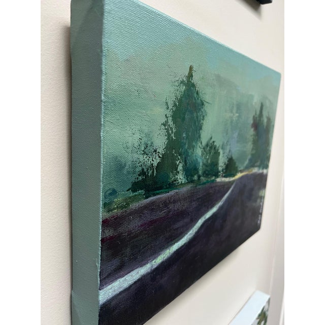 A distant forest shrouded in fog