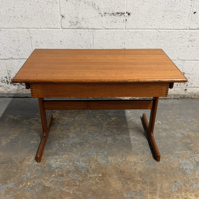 This Danish teak side table by Kai Kristiansen for Vildbjerg is a great example of the clean, thoughtful design that makes...