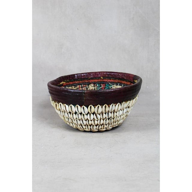 Infuse your home with the rich history and striking aesthetics of northern nigeria with this vintage hausa bowl . A...