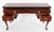 Beautiful wall table made of solid wood refined with mahogany veneer and ebonized moldings. The legs are made of solid...