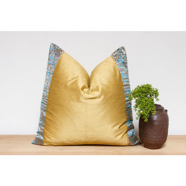 This brilliant silk euro pillow is a luxurious addition to any living room. Made out of silk with intricate borders of...