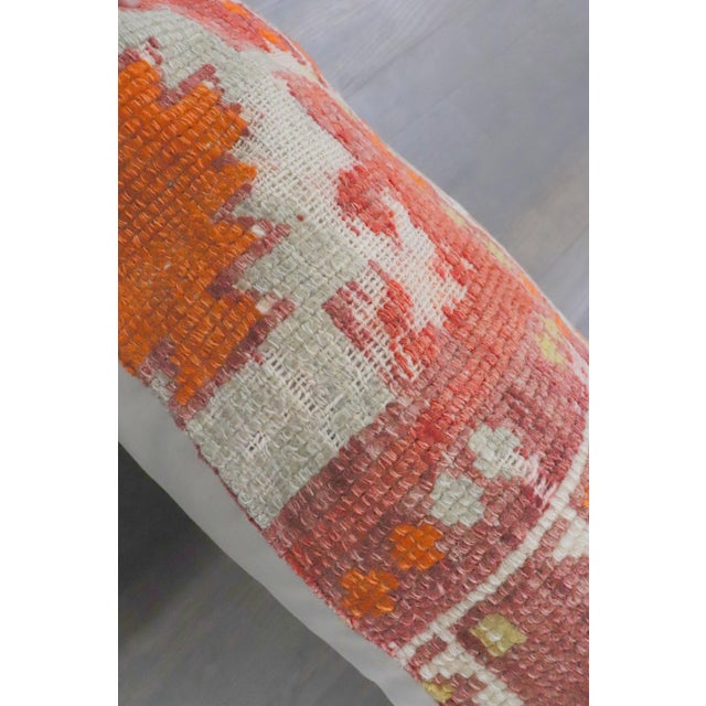 a large bolster size pillow Pillow made from a mid 20th century turkish anatolian rug 13'' x 33''