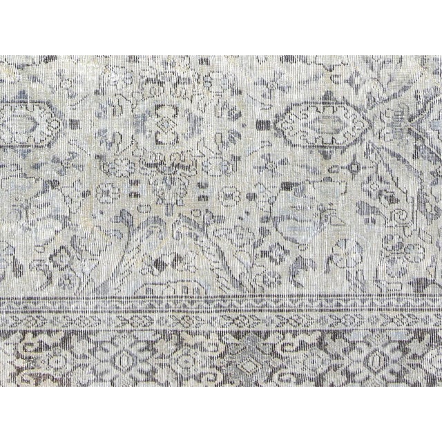 This authentic Semi Antique Persian Mahal Rug is a beautiful piece of craftsmanship, featuring a wool-on-cotton...