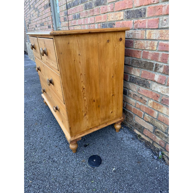 This is a lovely antique pine chest! This piece dates to the 19th century and has lovely patina. The wood has a warm glow,...