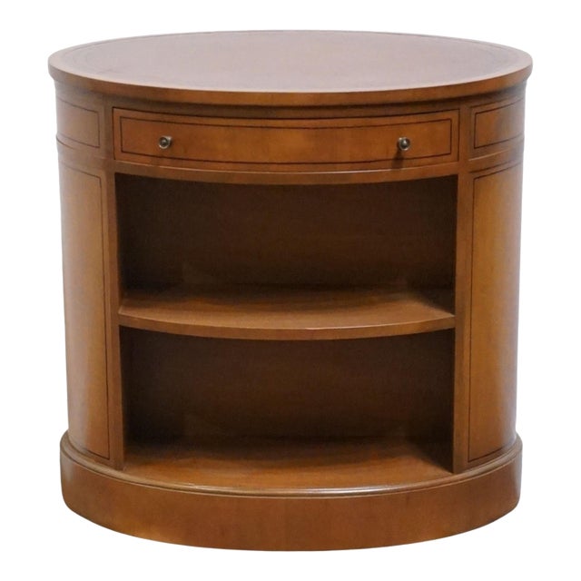 Baker Furniture Solid Mahogany Traditional Style 26" Oval Accent Bookcase End Table W. Tooled Leather Top For Sale