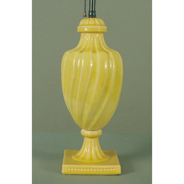 This handsome table lamp appears to have all its original hardware, including the plug; the metal parts have a lovely...