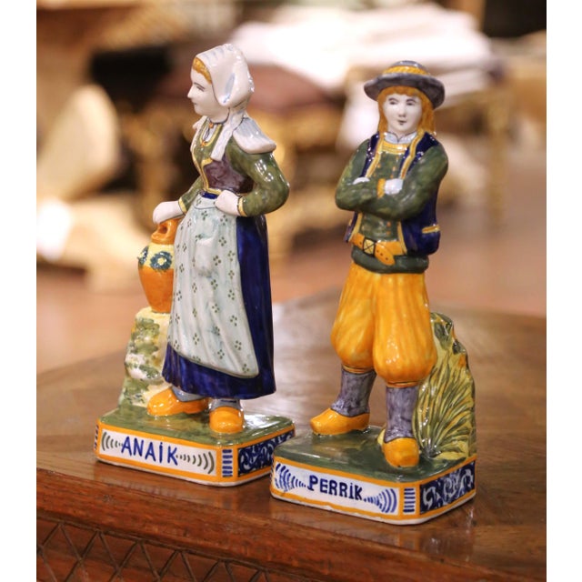 Bring regional Breton charm to a kitchen shelf or dining room display with this colorful pair of antique faience figures,...