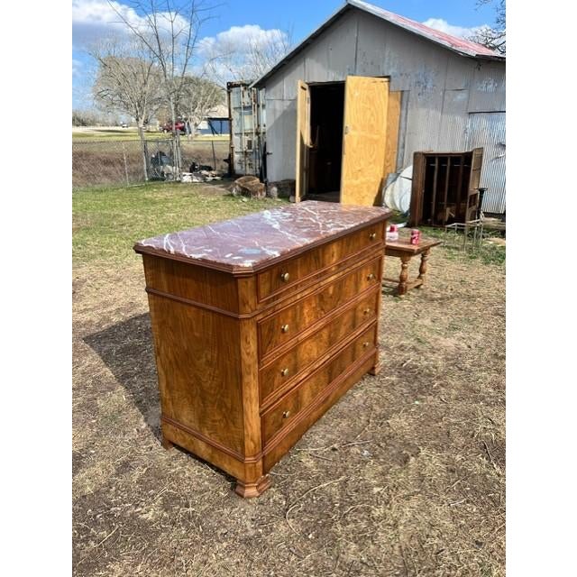 19th Century French Louis Philippe Commode from France. Made of burl walnut, with a marble top, the wood has been finished...