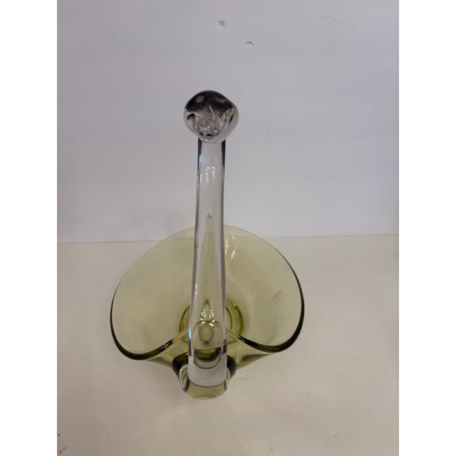 This hand blown art glass bowl or candy dish is in wonderful condition with no chips, cracks or scratches. It is carefully...