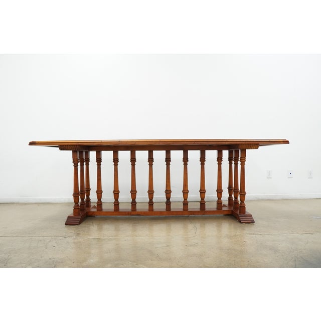 Vintage Century Furniture dining table, from the brand’s celebrated “Town & Country” collection, featuring a substantial...